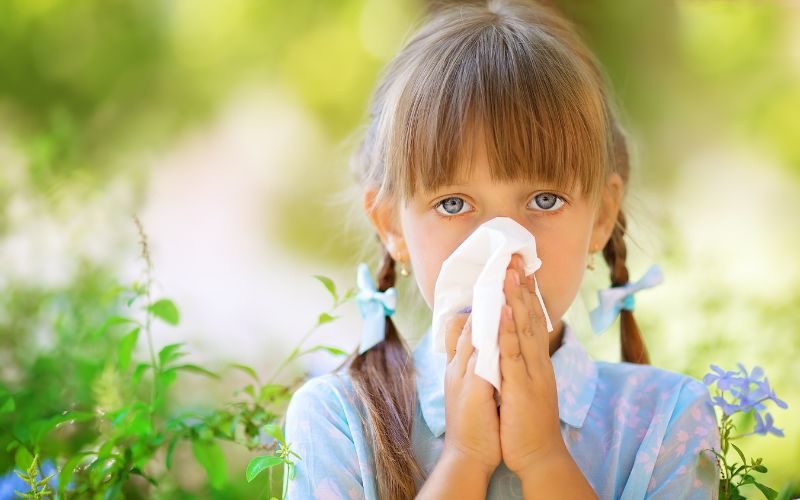 young girl with spring allergy
